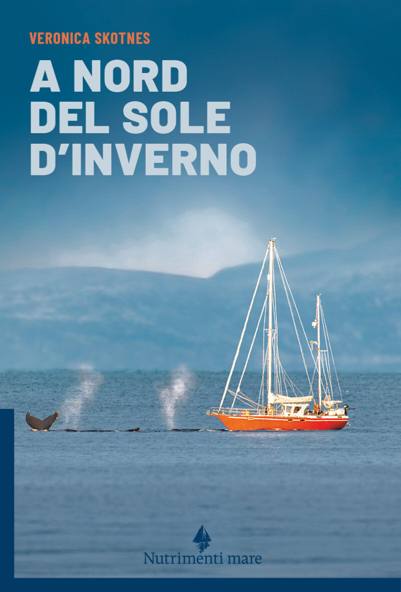 In copertina una barca mentra naviga con una balena nelle vicinanze.
